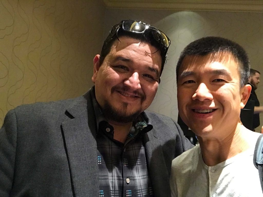 Armand Puyolt with Simon Chan at a network marketing event